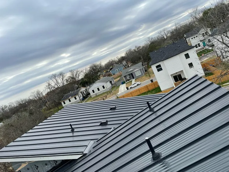 Standing seam metal roof panels with vents for Skylight Repair in Cahokia Heights